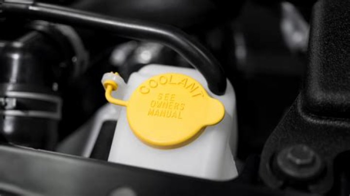 How do I loosen my coolant cap?