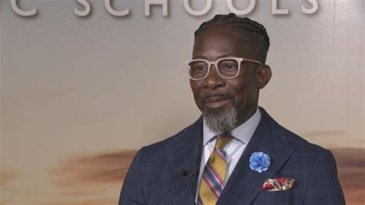 What is the role of a school district superintendent?