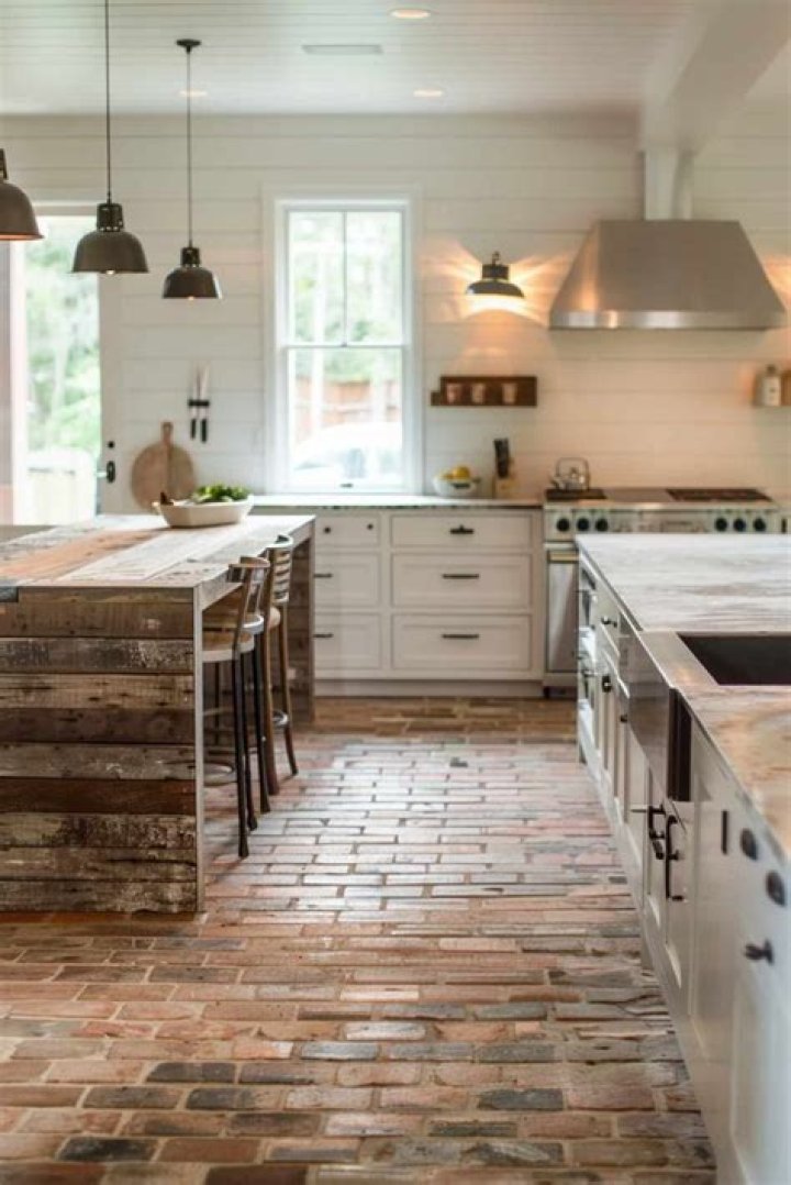 Which is better in the kitchen tile or hardwood?